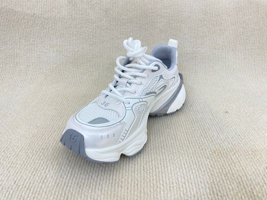 Women white running shoes with thick soled and breathable mesh upper