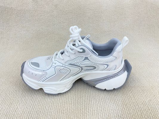 Women white running shoes with thick soled and breathable mesh upper