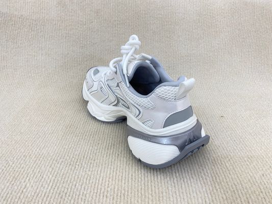 Women white running shoes with thick soled and breathable mesh upper